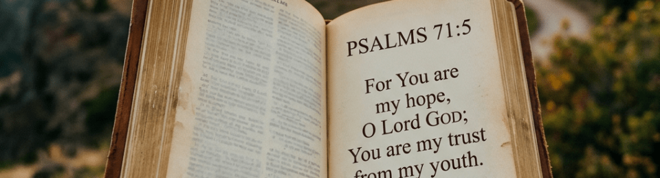 Open Bible showing Psalms 71:5 verse about hope and trust at sunset outdoors